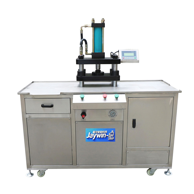 Vacuum powder press for cosmetic powder compacts and eyeshadow
